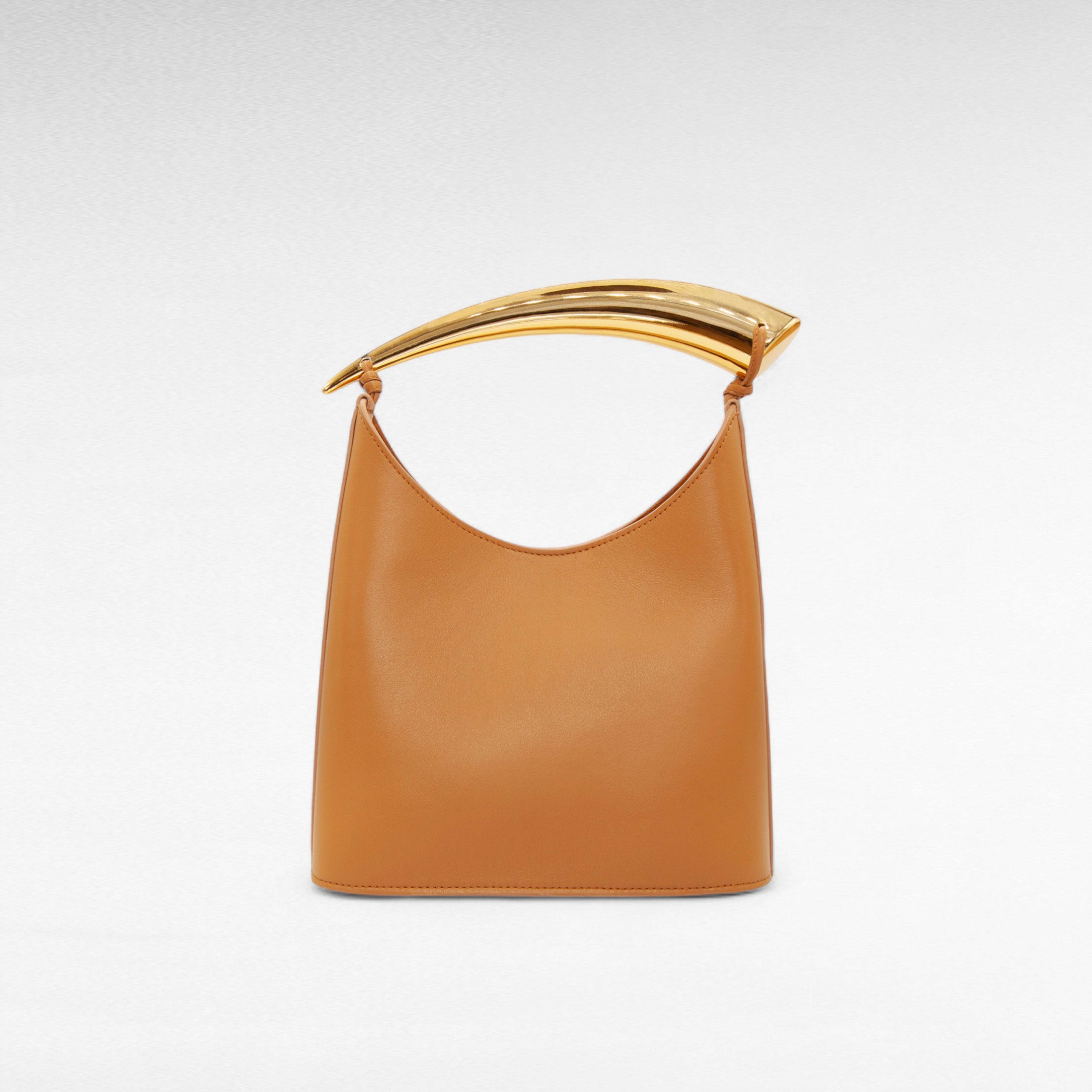 Caramel camel leather handbag with gold handle and inside zipped pouch