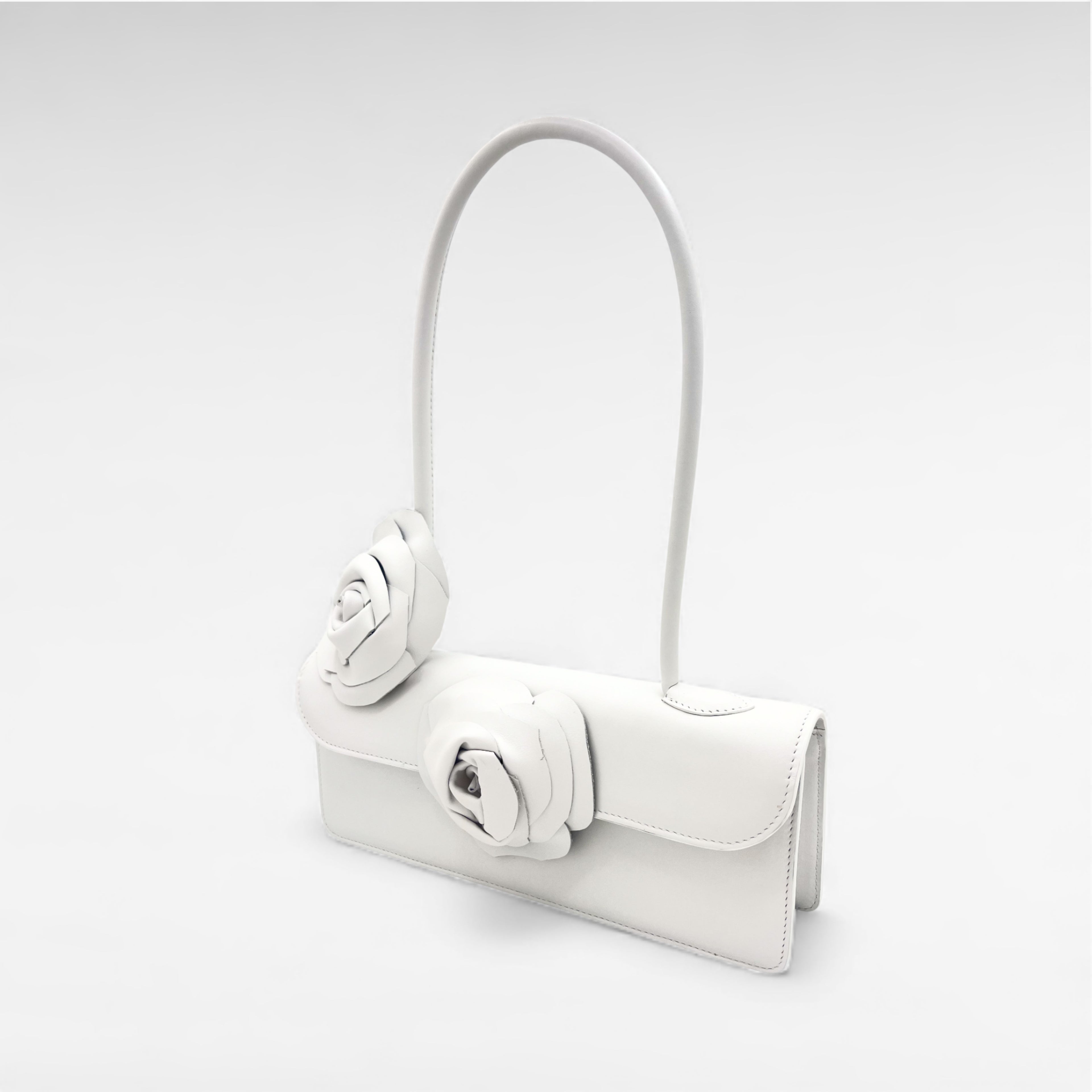 white leather handbag with flower