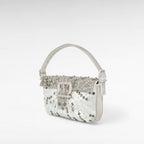 Silver velvet mini handbag with arabesque crystal design