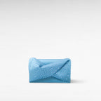 Blue hand-held clutch bag with crystal and front bow twist