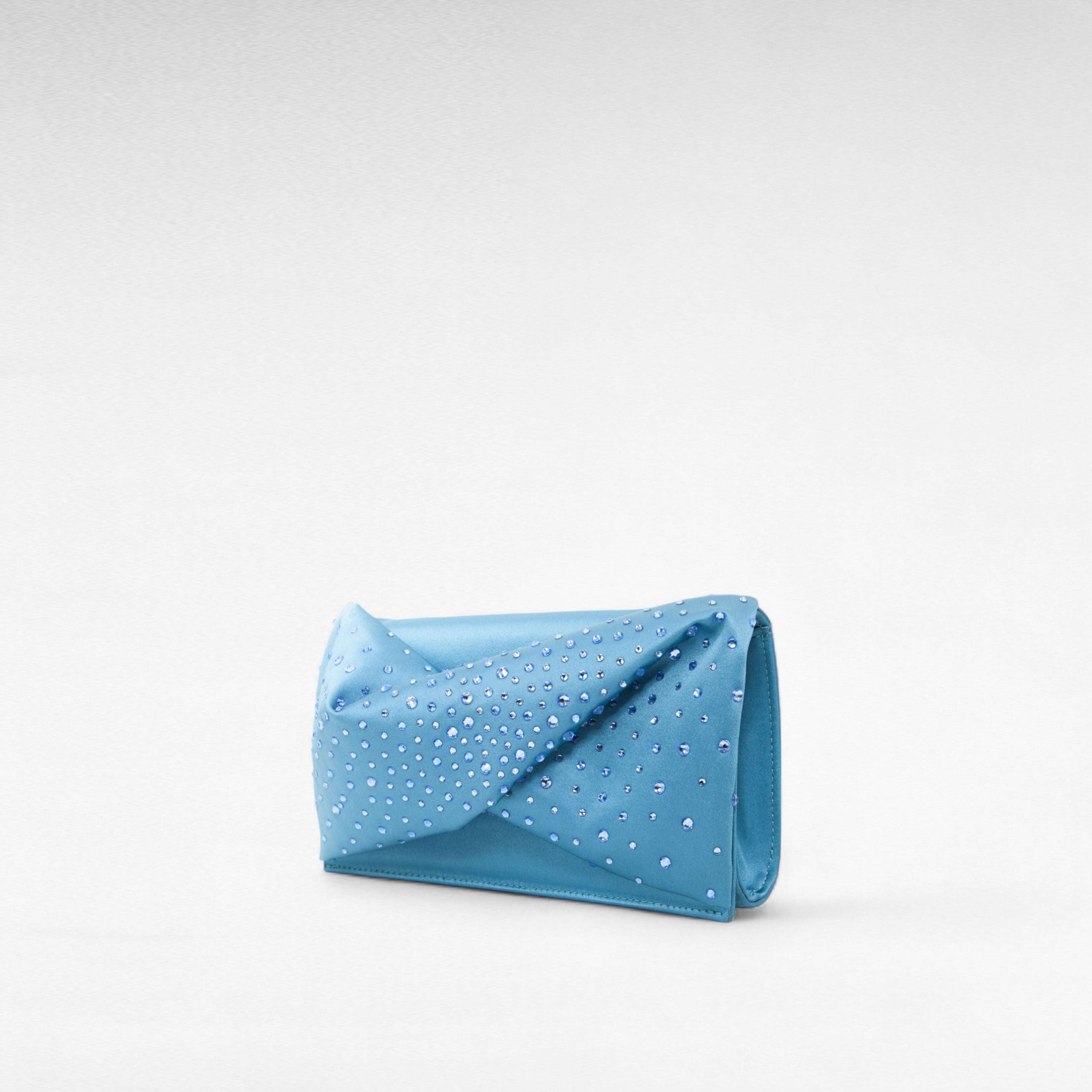 Blue hand-held clutch bag with crystal and front bow