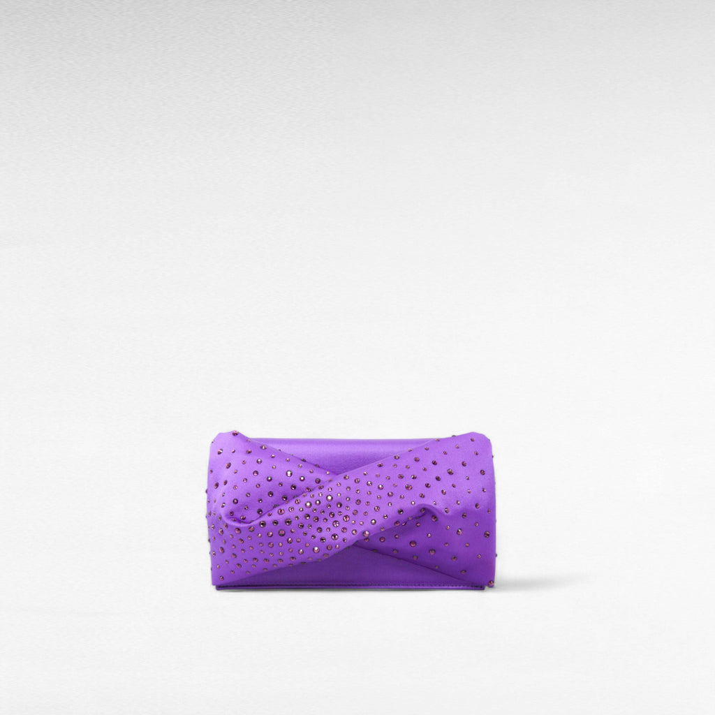 Blue hand-held clutch bag with crystal and front bow twist